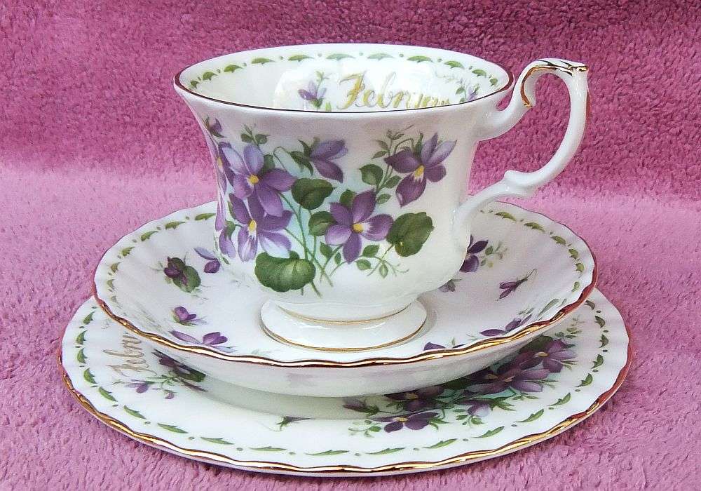 A VINTAGE ROYAL ALBERT TRIO - FLOWER OF THE MONTH SERIES - FEBRUARY