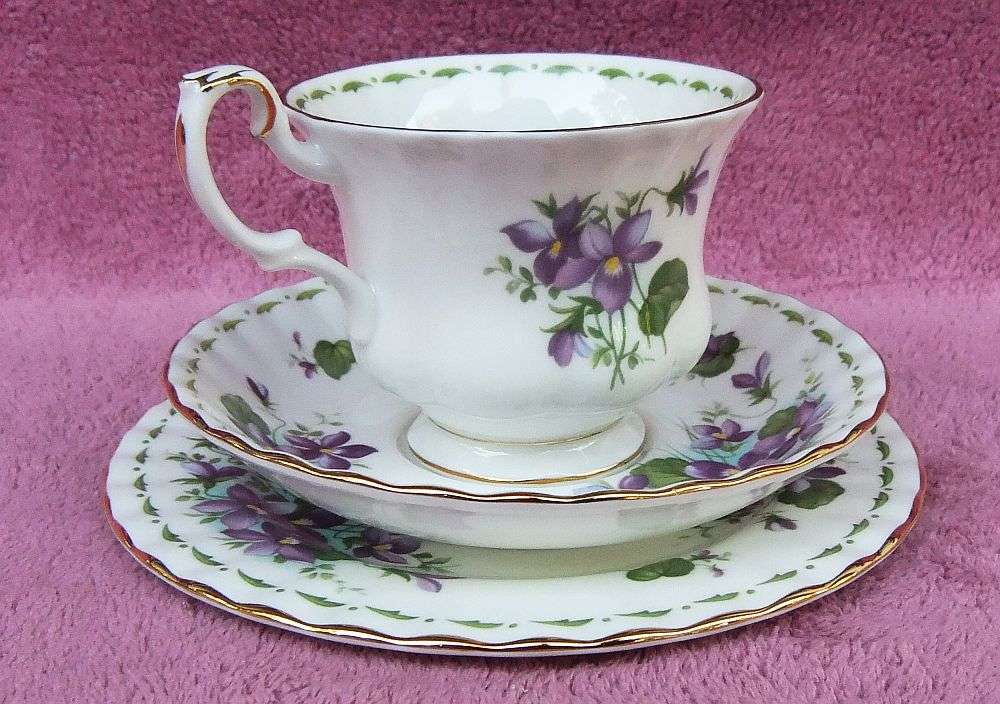 A VINTAGE ROYAL ALBERT TRIO - FLOWER OF THE MONTH SERIES - FEBRUARY