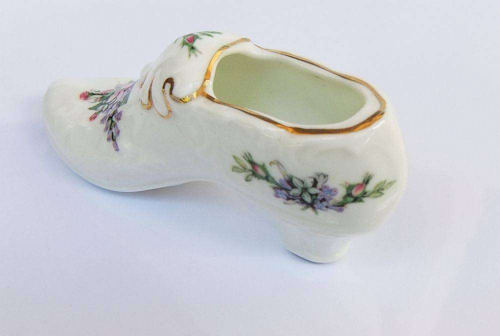 A very charming vintage porcelain trinket holder modelled as a Victorian shoe by Royal Albert