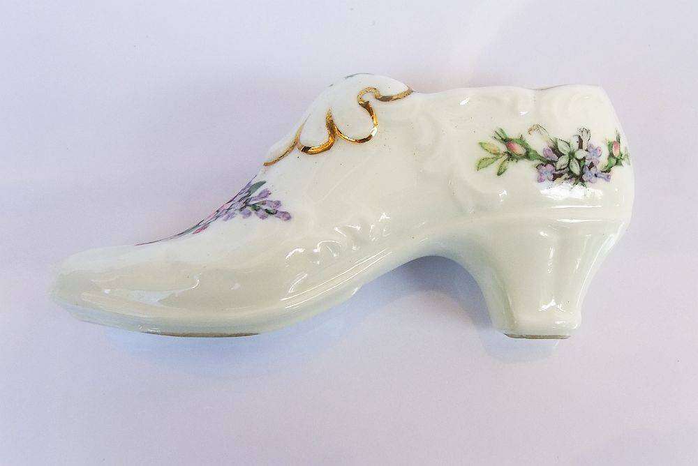 A very charming vintage porcelain trinket holder modelled as a Victorian shoe by Royal Albert