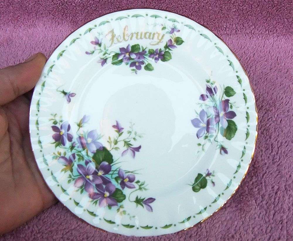 A VINTAGE ROYAL ALBERT TRIO - FLOWER OF THE MONTH SERIES - FEBRUARY