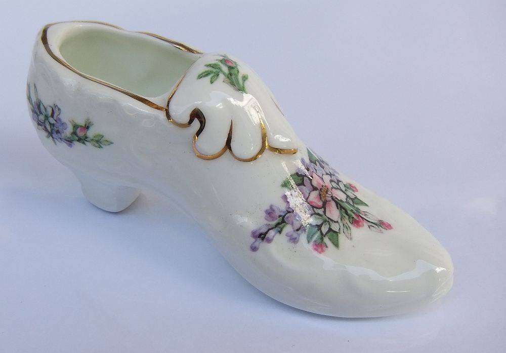 A very charming vintage porcelain trinket holder modelled as a Victorian shoe by Royal Albert