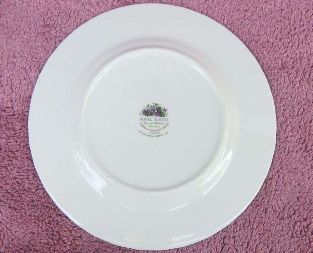 A VINTAGE ROYAL ALBERT TRIO - FLOWER OF THE MONTH SERIES - FEBRUARY