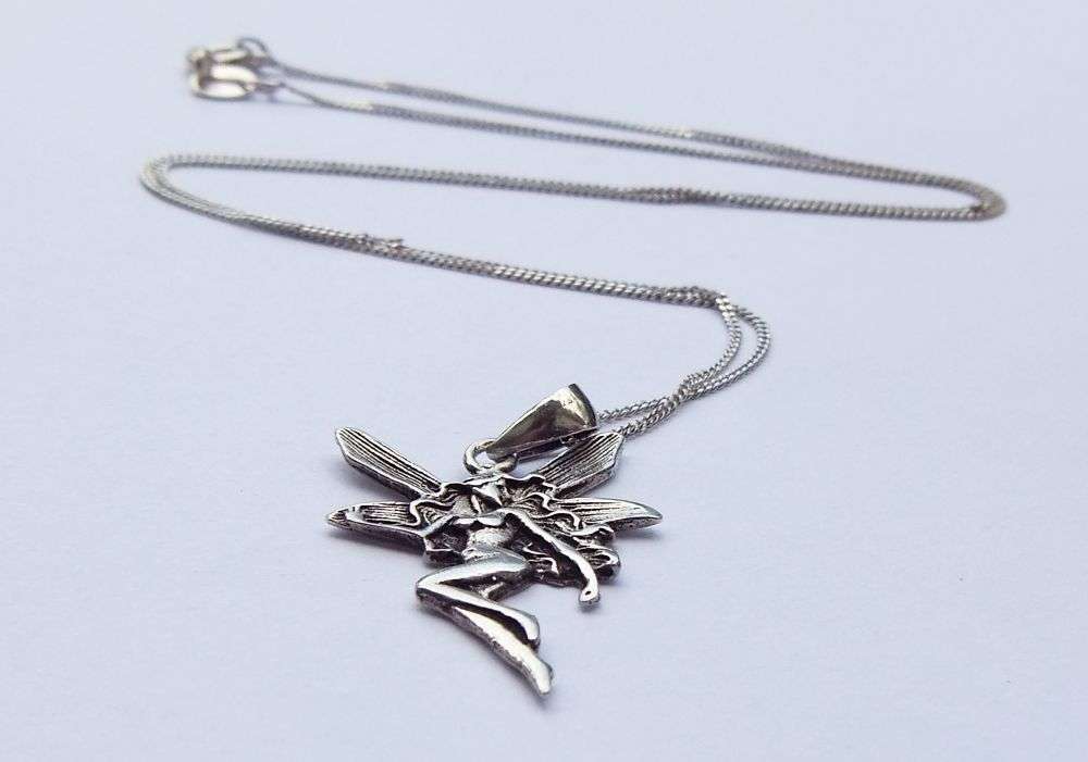 LAST ONE !! A LOVELY STERLING SILVER FAIRY PENDANT WITH A STERLING SILVER NECKLACE !! FREE COMBINING
