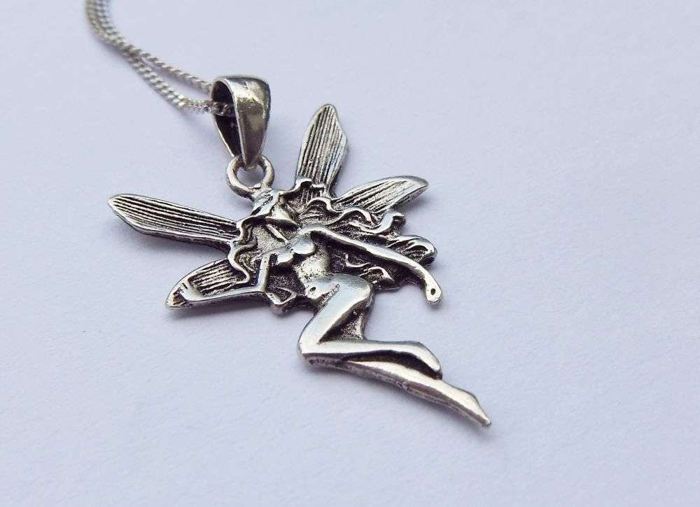 LAST ONE !! A LOVELY STERLING SILVER FAIRY PENDANT WITH A STERLING SILVER NECKLACE !! FREE COMBINING