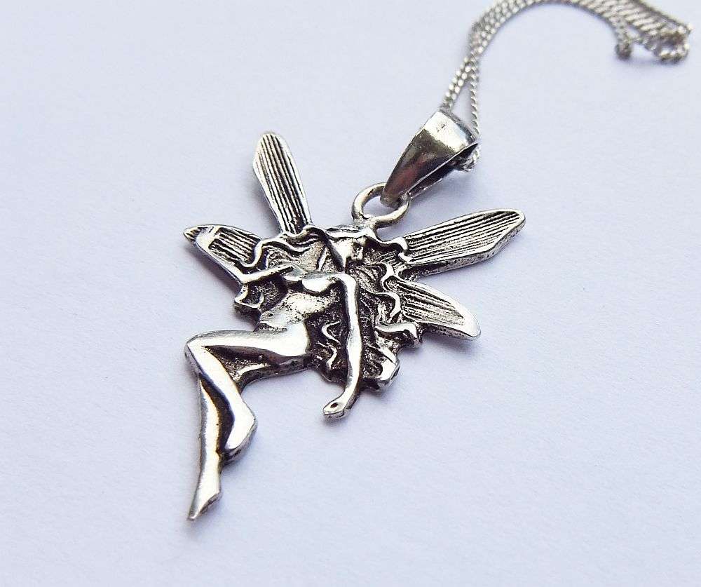 LAST ONE !! A LOVELY STERLING SILVER FAIRY PENDANT WITH A STERLING SILVER NECKLACE !! FREE COMBINING