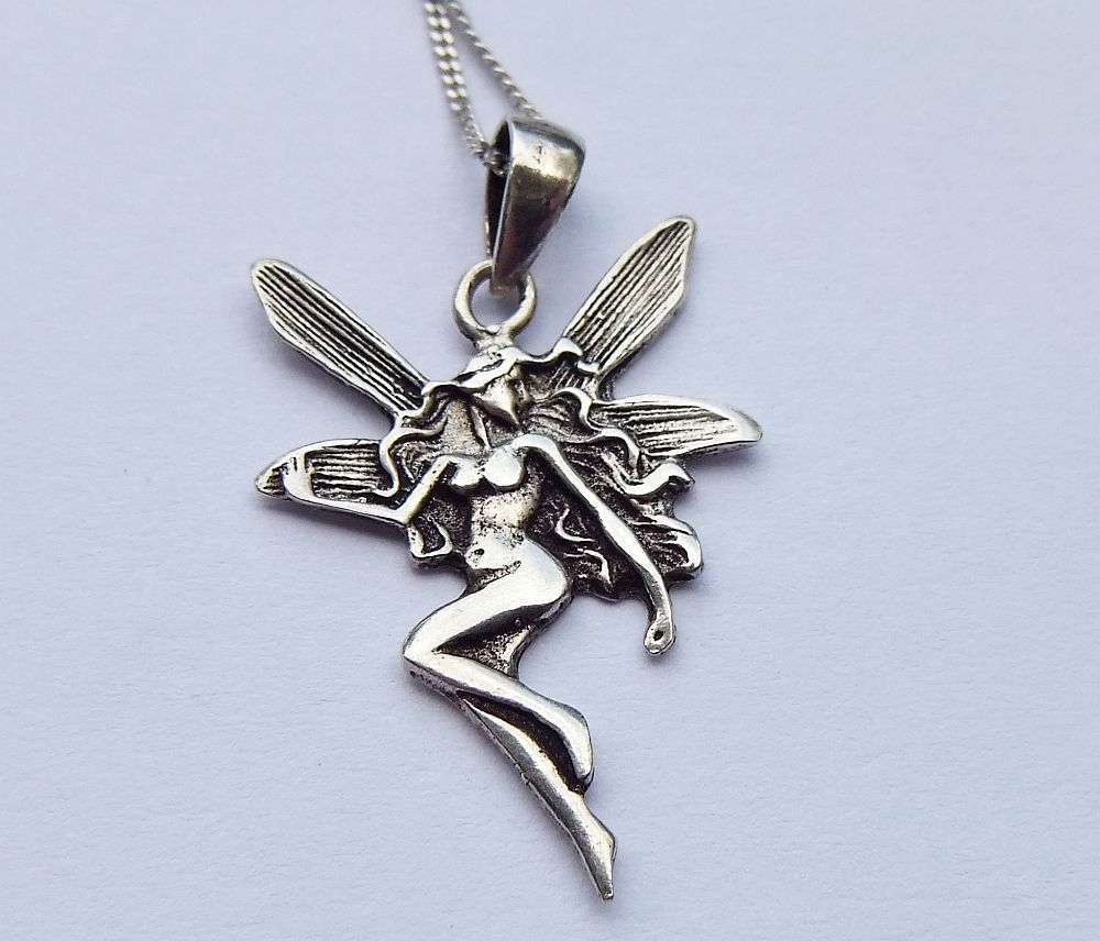 LAST ONE !! A LOVELY STERLING SILVER FAIRY PENDANT WITH A STERLING SILVER NECKLACE !! FREE COMBINING