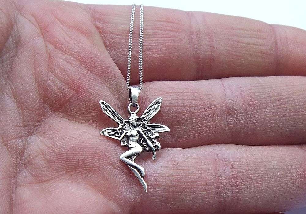 LAST ONE !! A LOVELY STERLING SILVER FAIRY PENDANT WITH A STERLING SILVER NECKLACE !! FREE COMBINING