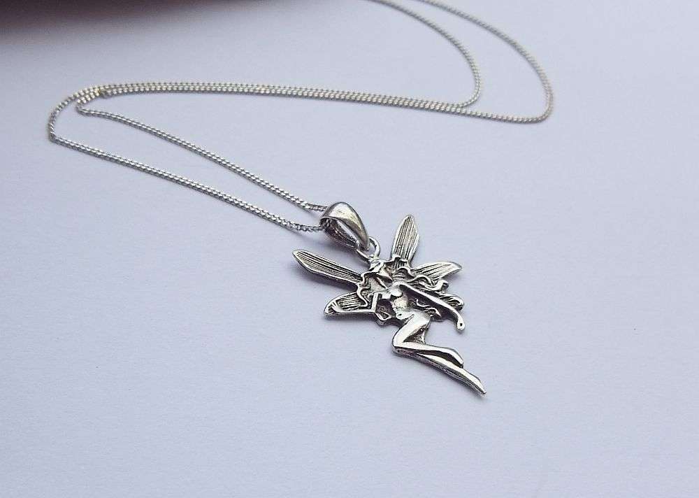 LAST ONE !! A LOVELY STERLING SILVER FAIRY PENDANT WITH A STERLING SILVER NECKLACE !! FREE COMBINING