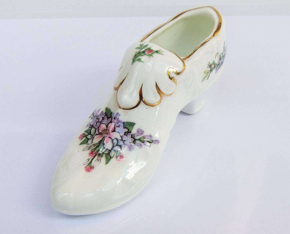 A very charming vintage porcelain trinket holder modelled as a Victorian shoe by Royal Albert