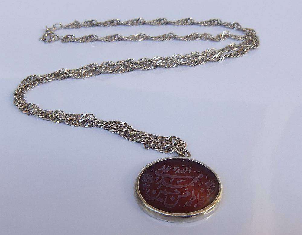 A stunning twist design sterling silver necklace with engraved Carnelian stone 90% silver pendant