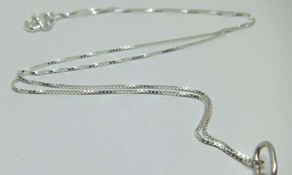 COOL DETAIL !! A VINTAGE STERLING SILVER TAURUS PENDANT WITH A NEW STERLING SILVER NECKLACE !!