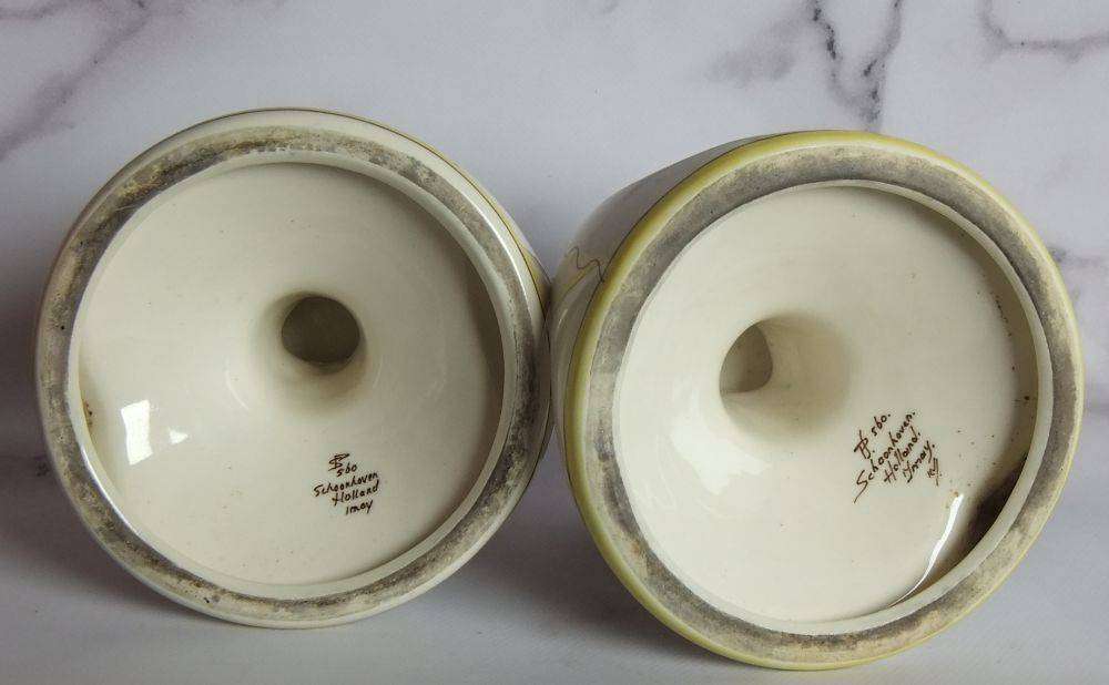A rare pair of beautiful hand painted Art Nouveau styled Schoonhoven Holland candle holders