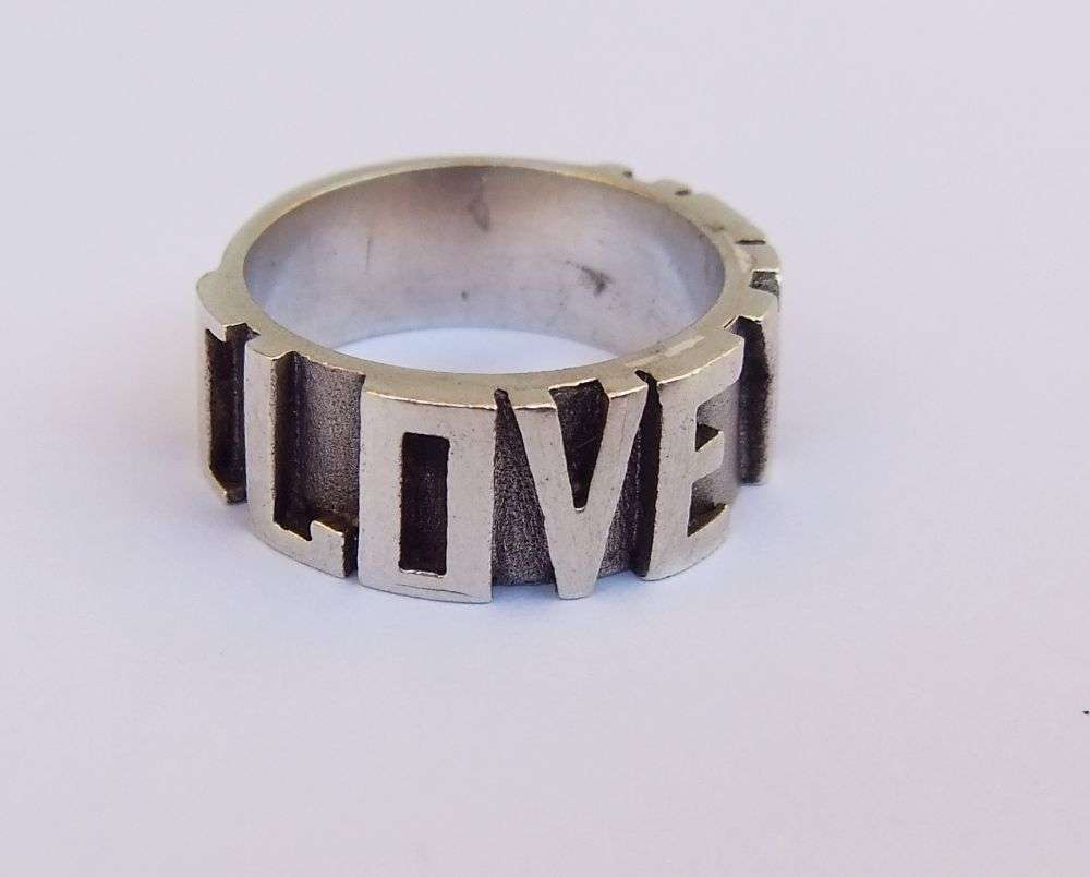 A UNIQUE THICK QUALITY SOLID STERLING SILVER RING WITH " I LOVE YOU " MOTIF !! MAYBE ONE OF A KIND !