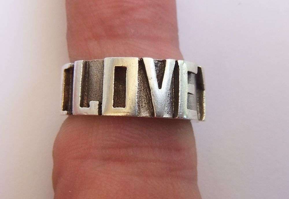 A UNIQUE THICK QUALITY SOLID STERLING SILVER RING WITH " I LOVE YOU " MOTIF !! MAYBE ONE OF A KIND !