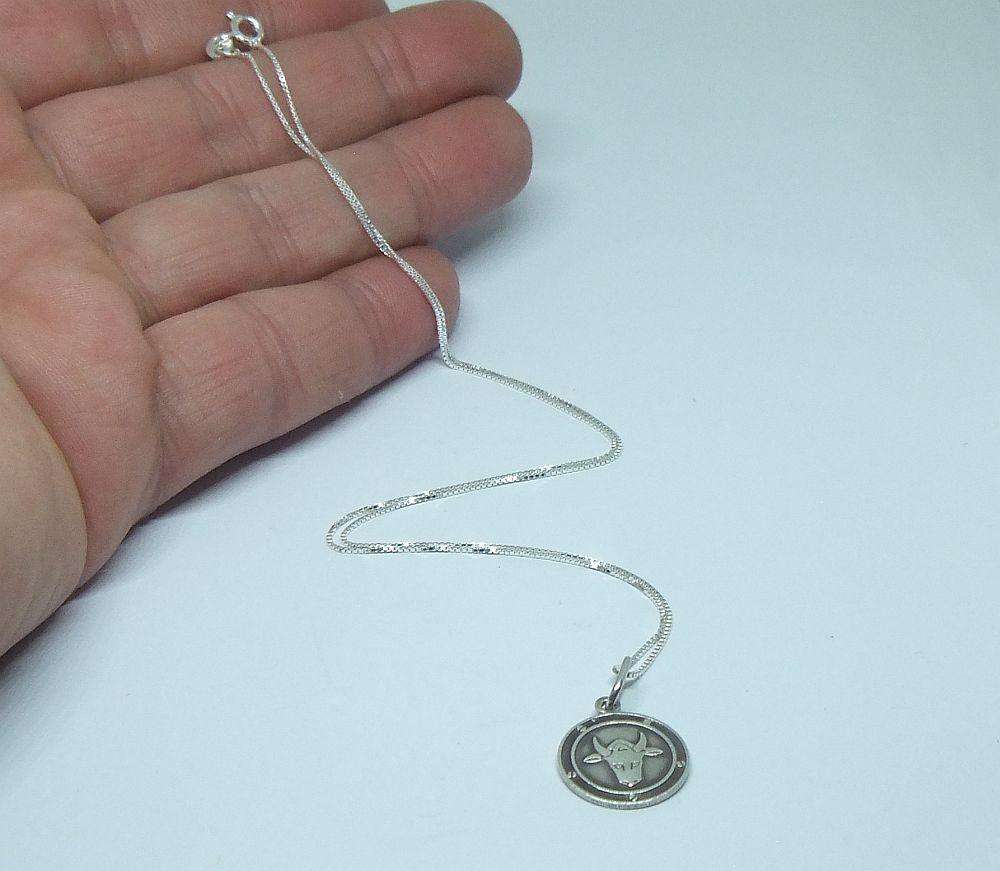 COOL DETAIL !! A VINTAGE STERLING SILVER TAURUS PENDANT WITH A NEW STERLING SILVER NECKLACE !!