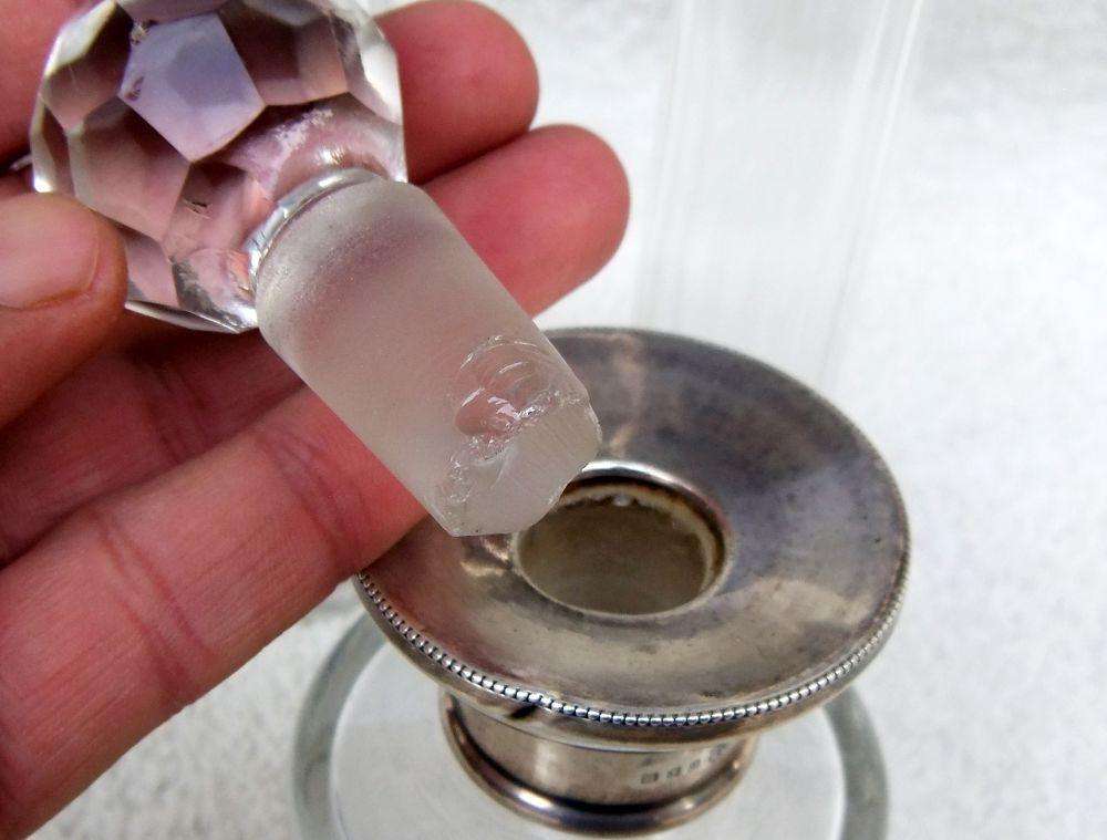 AN ANTIQUE BOTTLE WITH HALLMARKED SILVER COLLAR DATED 1918 , ANOTHER WITH SILVER LID PLUS 2 MORE !!