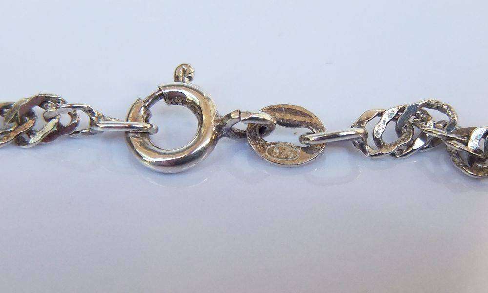 A stunning twist design sterling silver necklace with engraved Carnelian stone 90% silver pendant