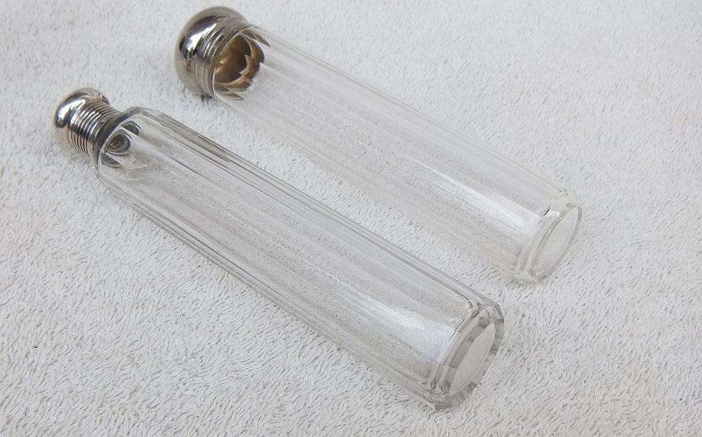 AN ANTIQUE BOTTLE WITH HALLMARKED SILVER COLLAR DATED 1918 , ANOTHER WITH SILVER LID PLUS 2 MORE !!