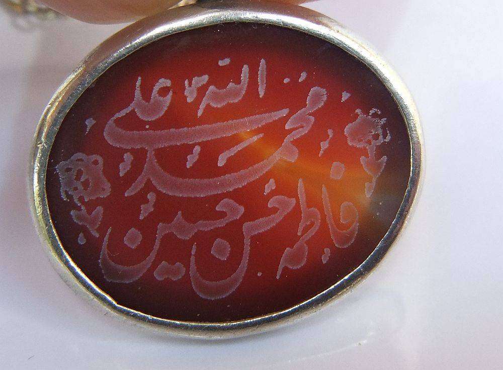 A stunning twist design sterling silver necklace with engraved Carnelian stone 90% silver pendant