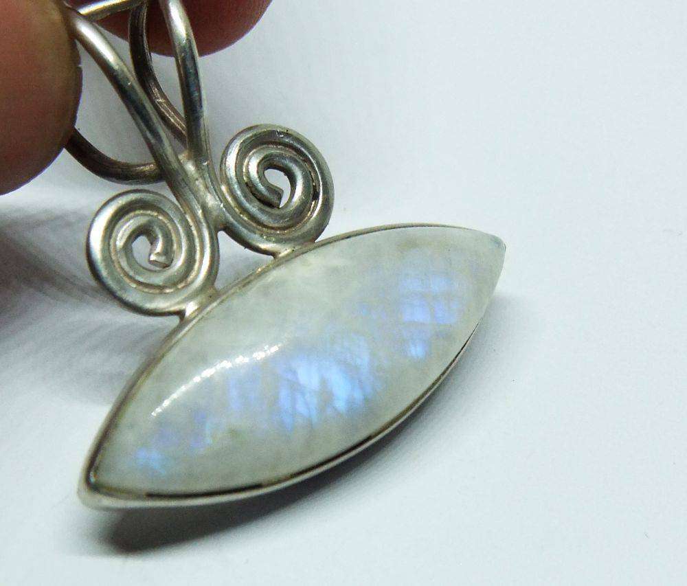 An amazing vintage sterling silver pendant set with a genuine cabochon Moonstone