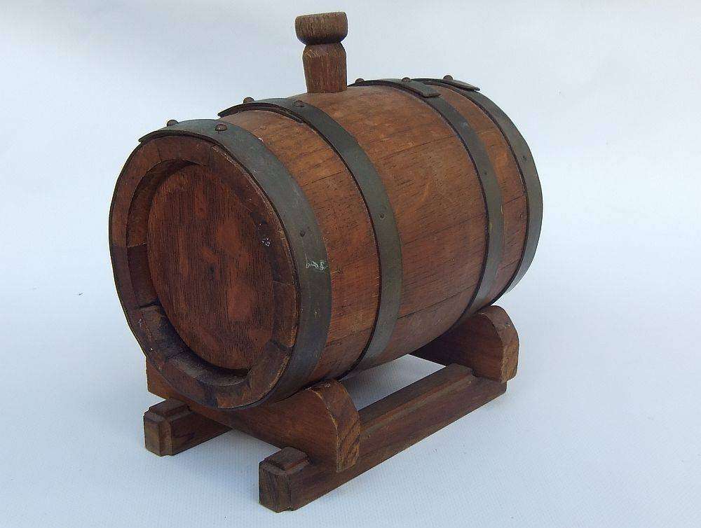 An awesome vintage oak wine barrel with brass bands and tap in great cosmetic condition