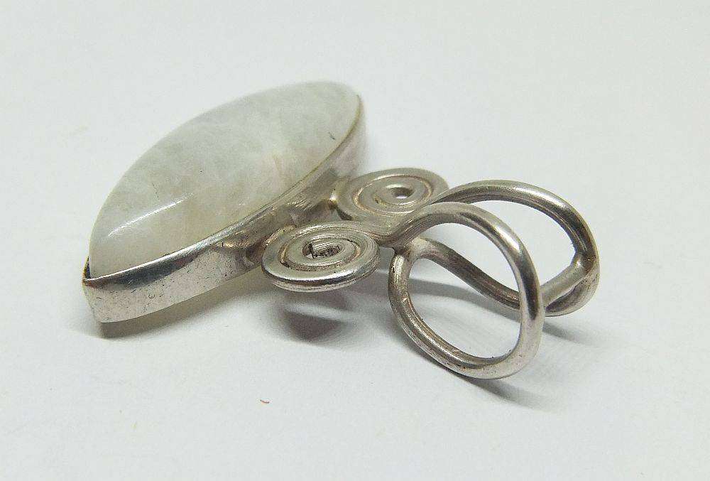 An amazing vintage sterling silver pendant set with a genuine cabochon Moonstone