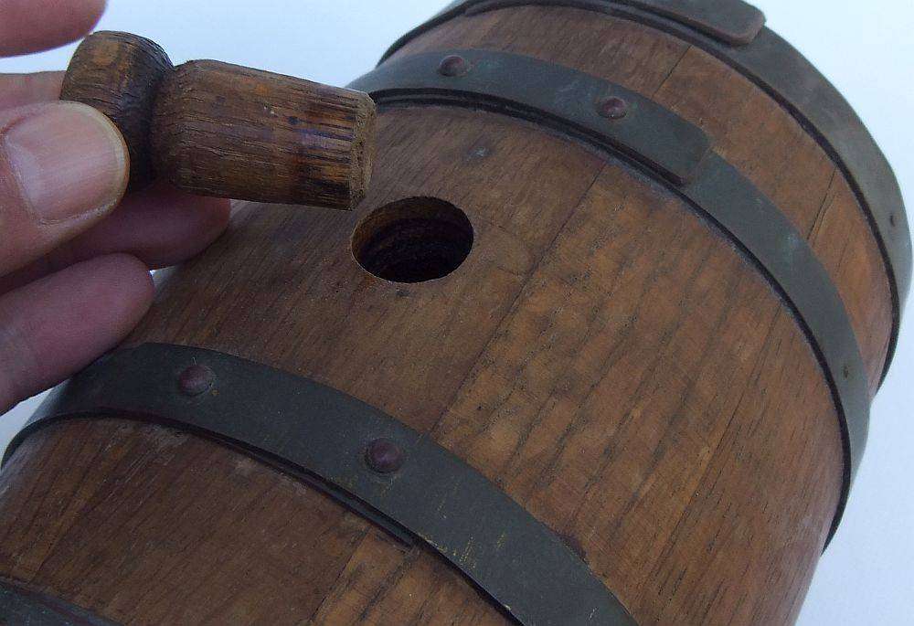 An awesome vintage oak wine barrel with brass bands and tap in great cosmetic condition