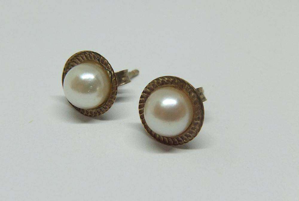 A pair of vintage 9ct gold genuine pearl earrings with timeless appeal