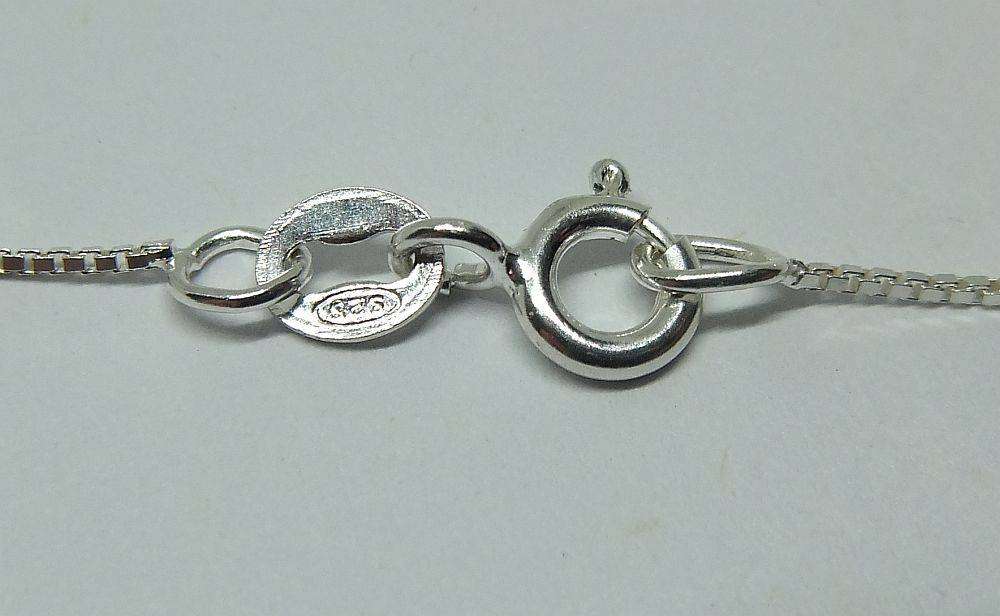 A vintage solid silver Aries Zodiac sign pendant with a sterling silver necklace