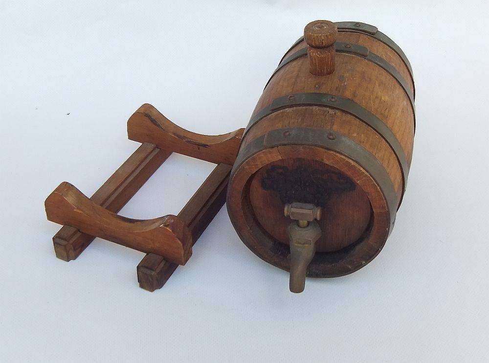 An awesome vintage oak wine barrel with brass bands and tap in great cosmetic condition