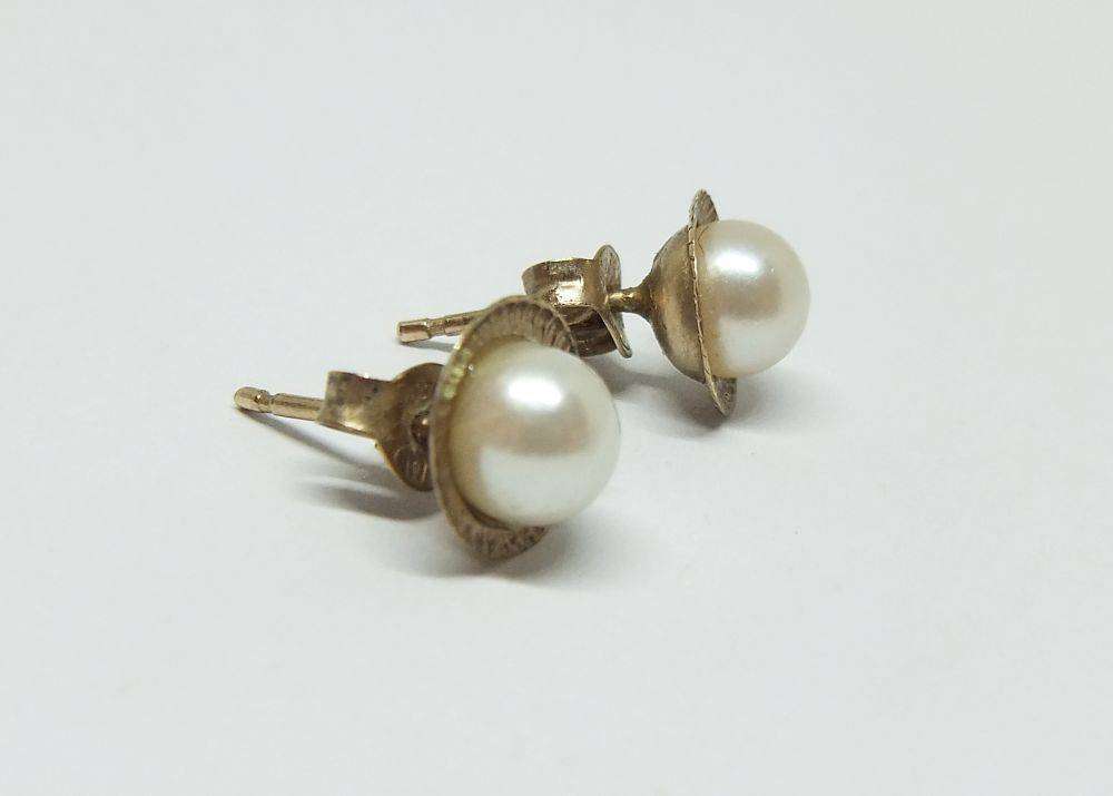 A pair of vintage 9ct gold genuine pearl earrings with timeless appeal