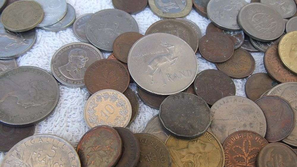 TAKE A LOOK !! A HANDMADE WOODEN BOX WITH OVER 200 OLD COINS FROM ALLOT OF PLACES !!