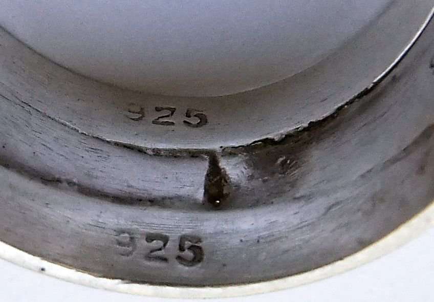 A BEAUTIFUL STERLING SILVER RING WITH FACETED BLUE CZ AND CLEAR CZ STONES - 3 MADE INTO ONE