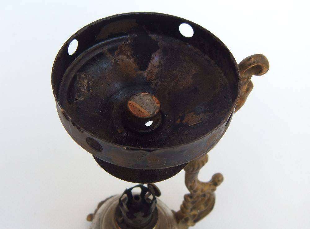 An antique Vapo Cresolene vaporizer with original box patented in the 1880's