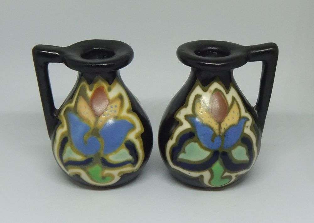A VINTAGE PAIR OF GOUDA STYLE HAND PAINTED MINIATURE EWER ORNAMENTS