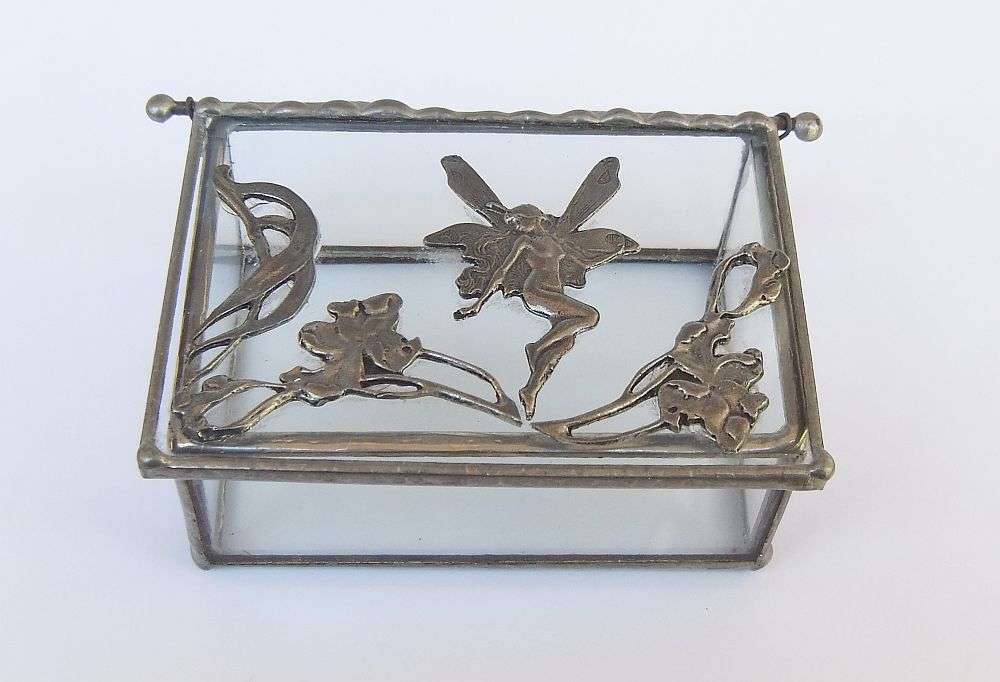 A VINTAGE LEAD AND GLASS TRINKET BOX WITH FAIRY MOTIF AND ART NOUVEAU PATTERN