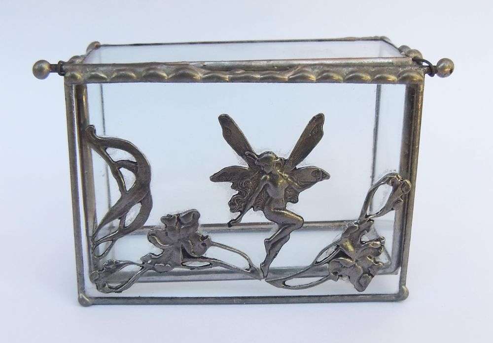 A VINTAGE LEAD AND GLASS TRINKET BOX WITH FAIRY MOTIF AND ART NOUVEAU PATTERN