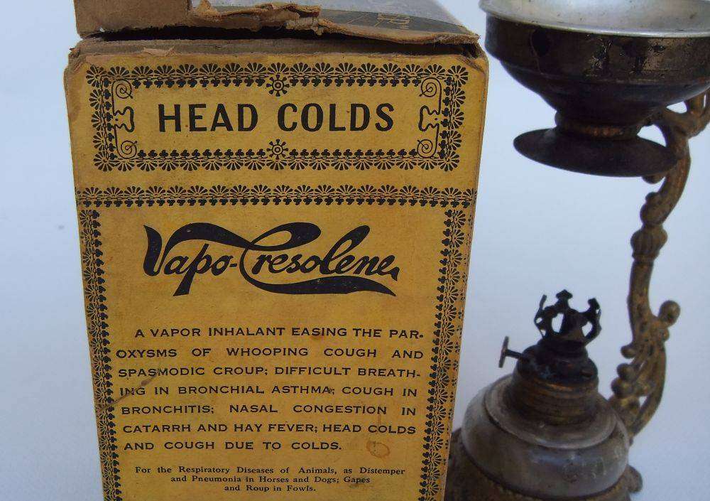 An antique Vapo Cresolene vaporizer with original box patented in the 1880's