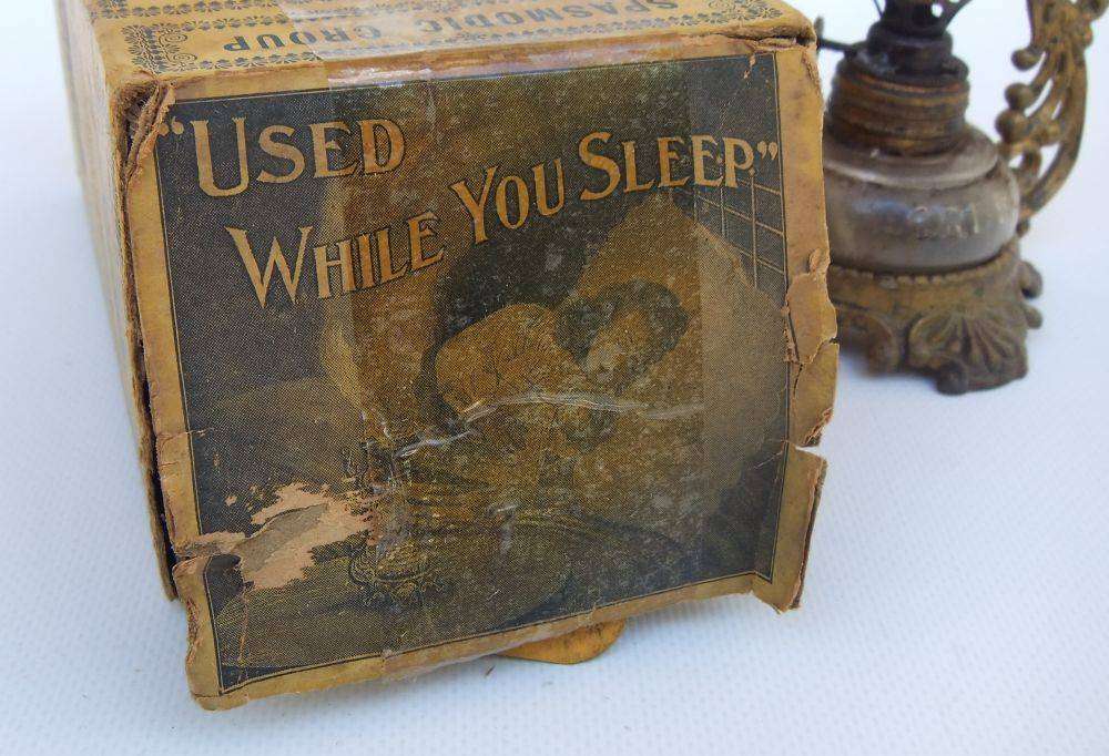 An antique Vapo Cresolene vaporizer with original box patented in the 1880's