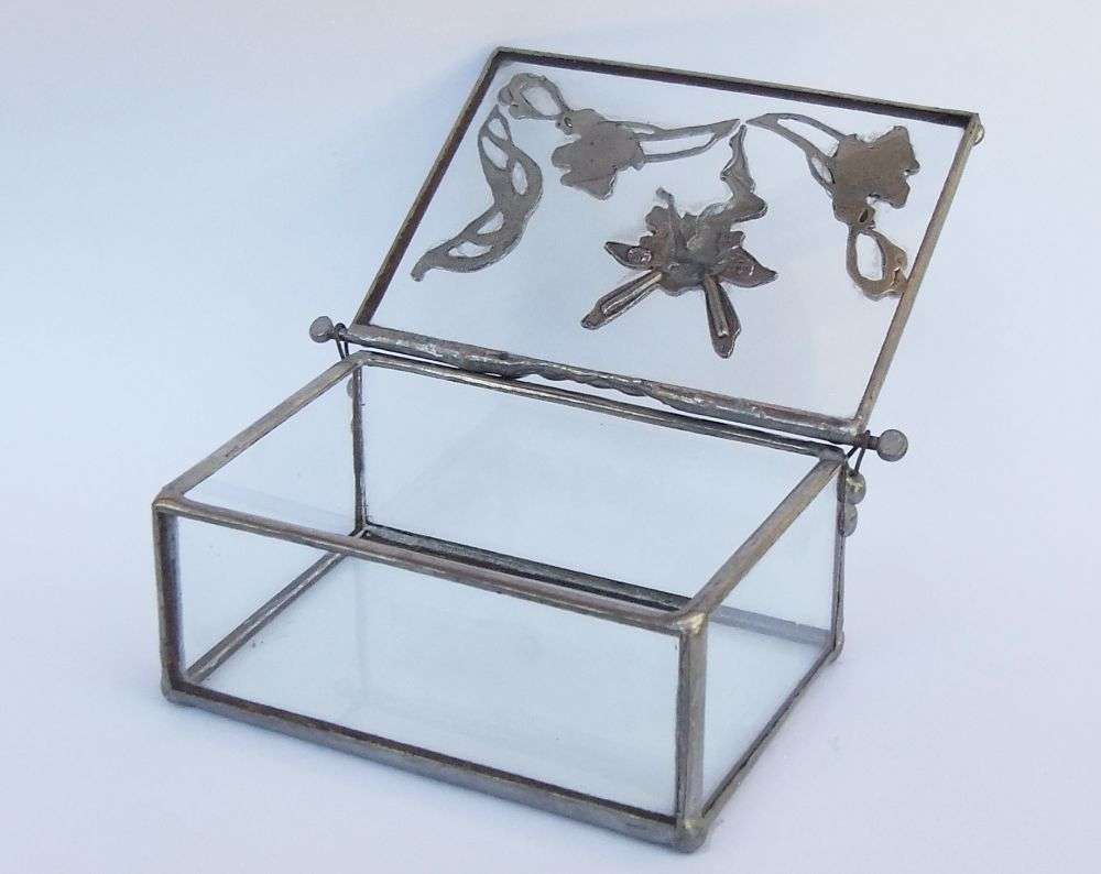 A VINTAGE LEAD AND GLASS TRINKET BOX WITH FAIRY MOTIF AND ART NOUVEAU PATTERN