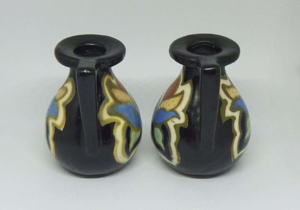 A VINTAGE PAIR OF GOUDA STYLE HAND PAINTED MINIATURE EWER ORNAMENTS