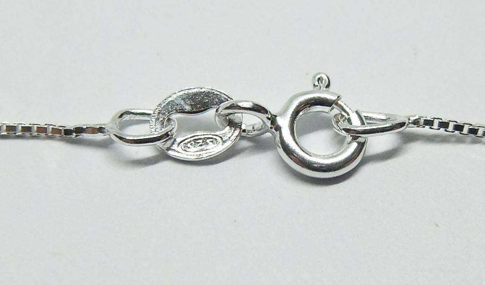 A vintage solid silver Virgo Zodiac sign pendant with a sterling silver necklace