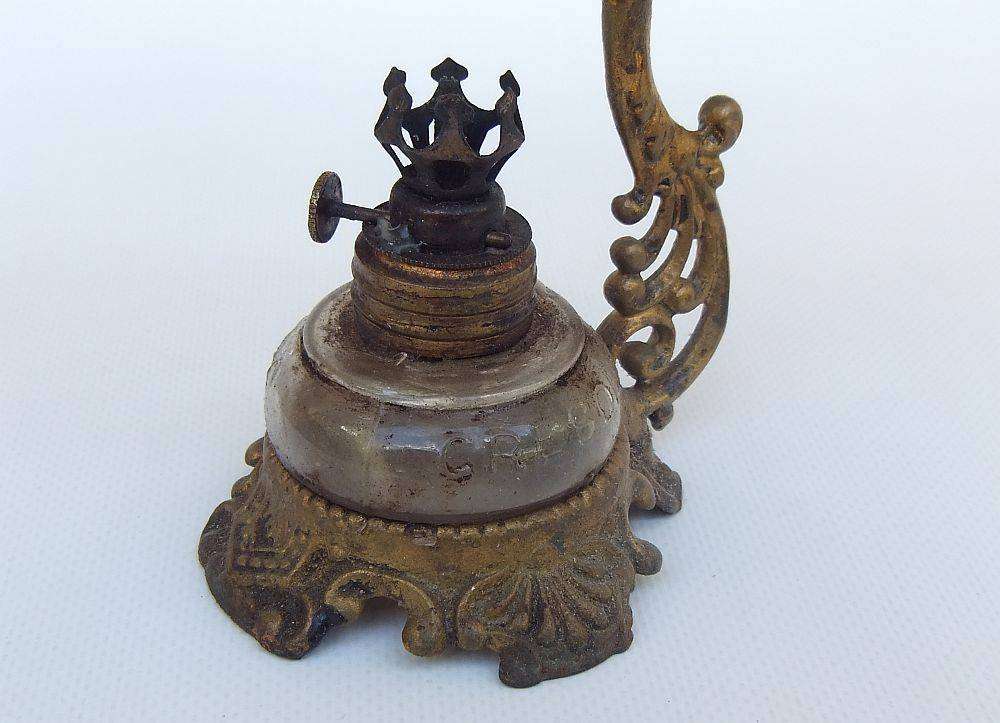 An antique Vapo Cresolene vaporizer with original box patented in the 1880's