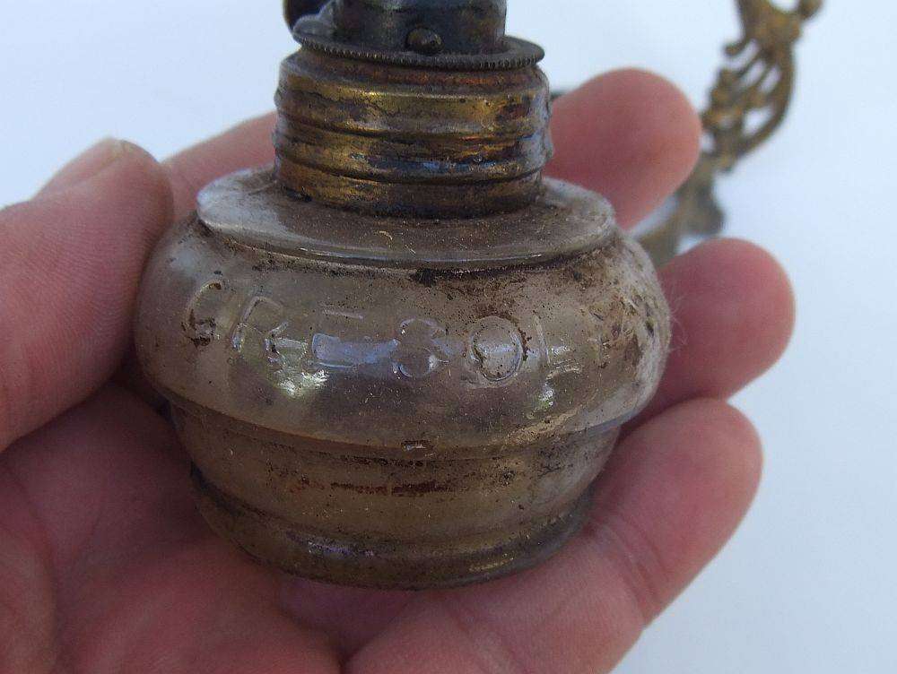 An antique Vapo Cresolene vaporizer with original box patented in the 1880's