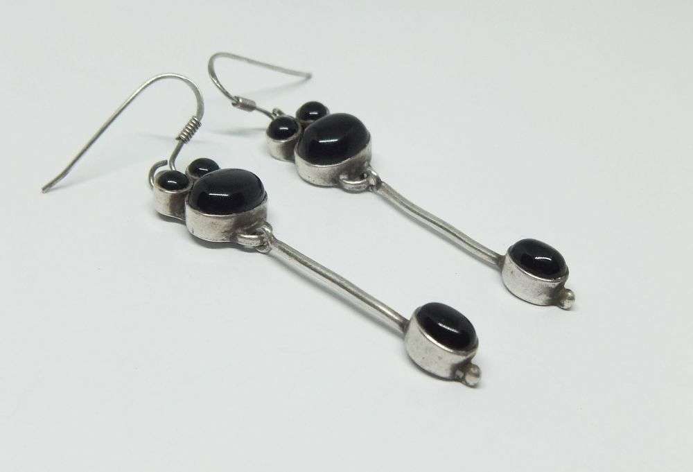 WOW !! A UNIQUE PAIR OF STERLING SILVER EARRINGS SET WITH CABOCHON BLACK ONYX STONES !! STUNNING !!