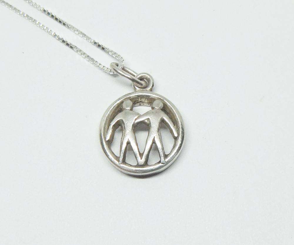 A vintage German 835 silver Gemini Zodiac sign pendant plus a sterling silver necklace