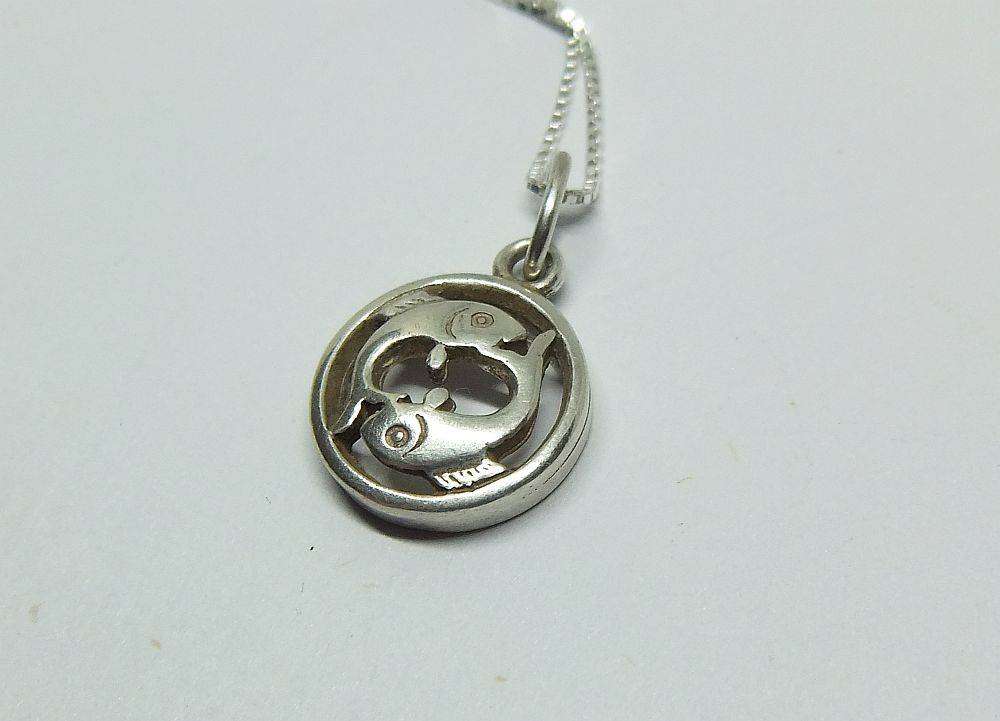 A vintage German 835 silver Pisces Zodiac sign pendant plus a sterling silver necklace