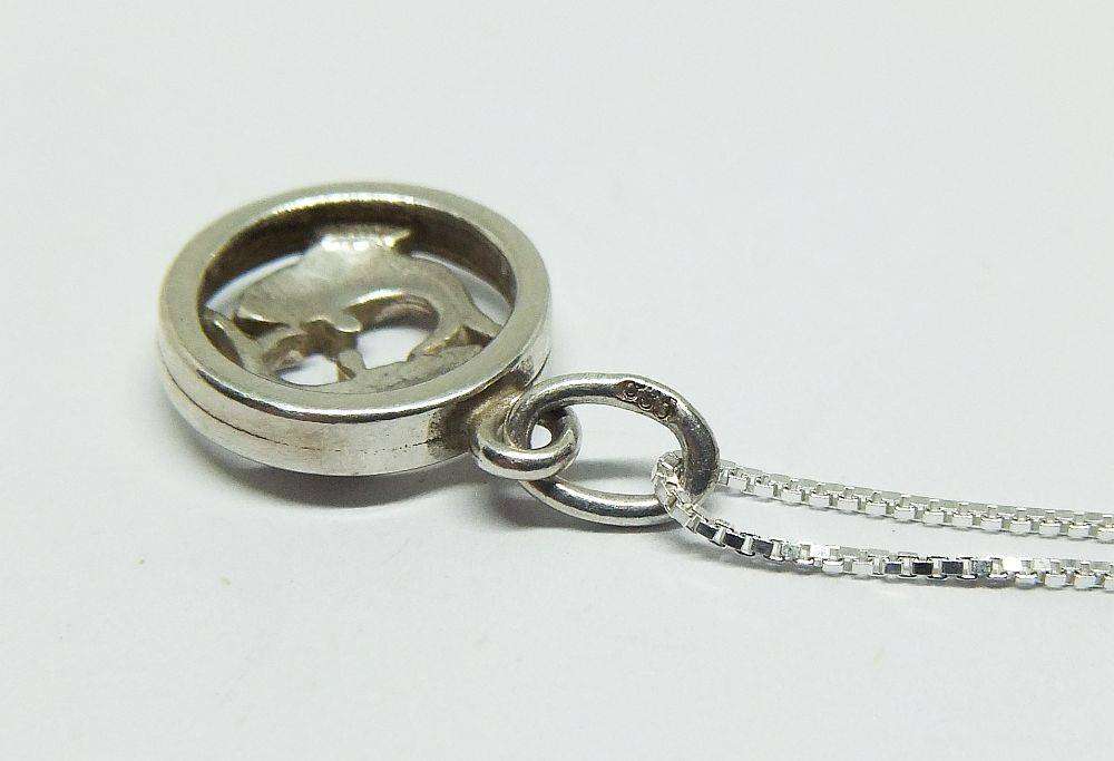 A vintage German 835 silver Pisces Zodiac sign pendant plus a sterling silver necklace