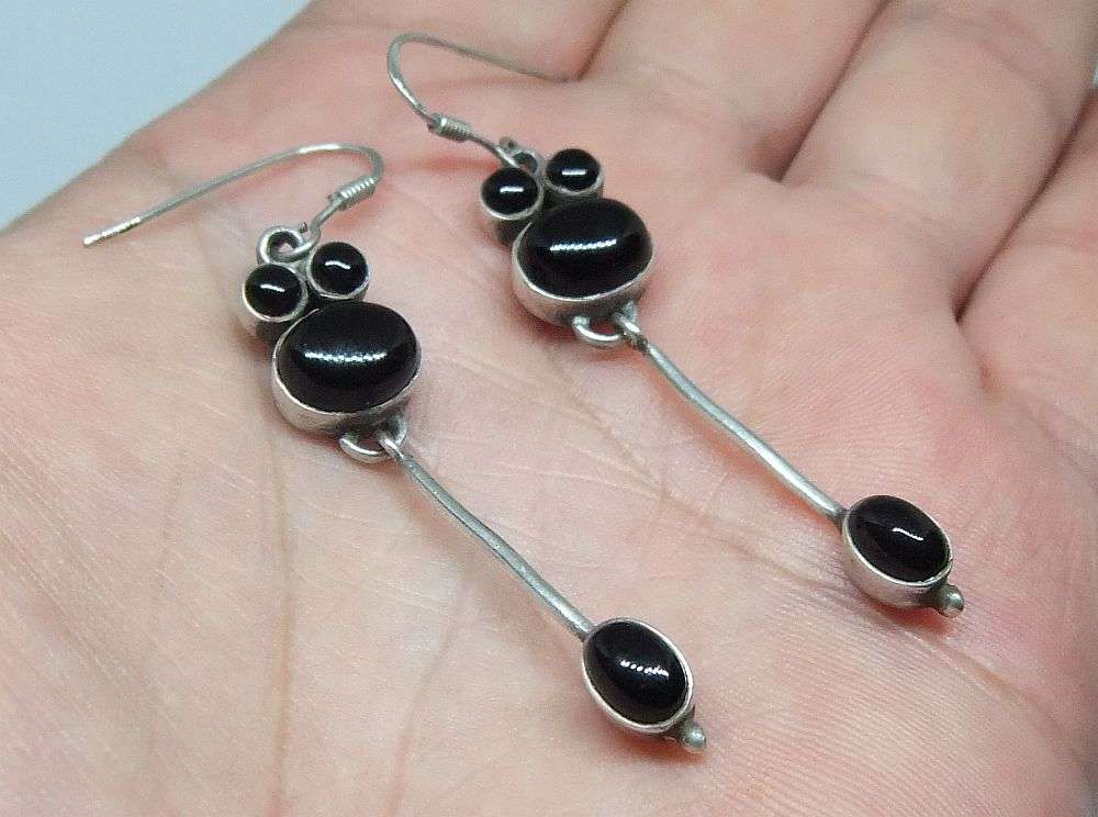 WOW !! A UNIQUE PAIR OF STERLING SILVER EARRINGS SET WITH CABOCHON BLACK ONYX STONES !! STUNNING !!